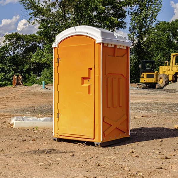 how often are the portable restrooms cleaned and serviced during a rental period in Marquette IA